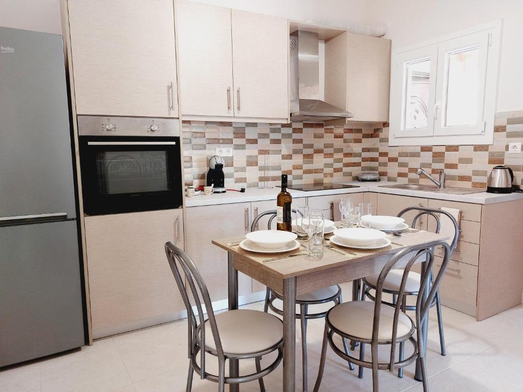 Kuchyň nebo kuchyňský kout v ubytování STAMATIS CORFU APARTMENTS