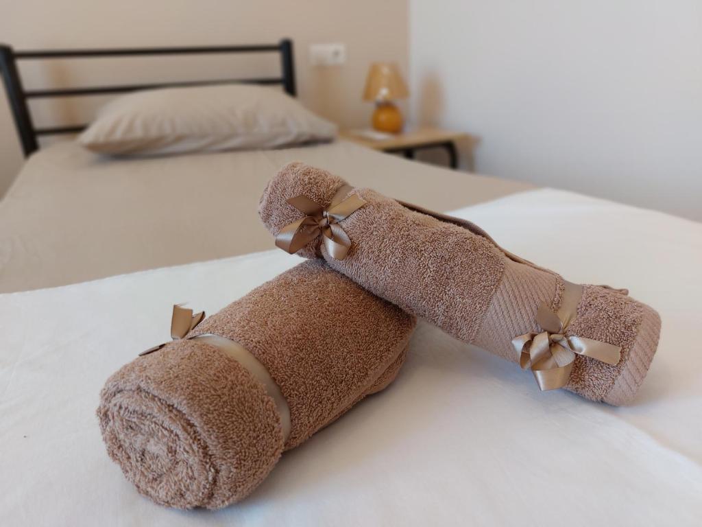 Postel nebo postele na pokoji v ubytování STAMATIS CORFU APARTMENTS