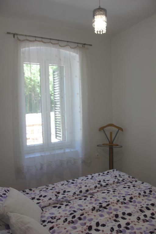 Posteľ alebo postele v izbe v ubytovaní Apartment Kantrida