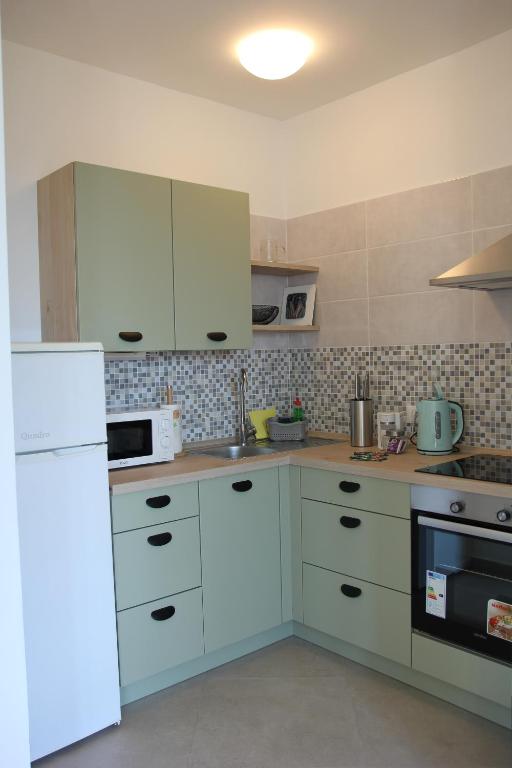 Kuchyňa alebo kuchynka v ubytovaní Apartment Kantrida