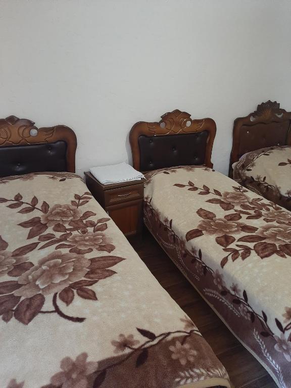Postel nebo postele na pokoji v ubytování NarVar Hotel