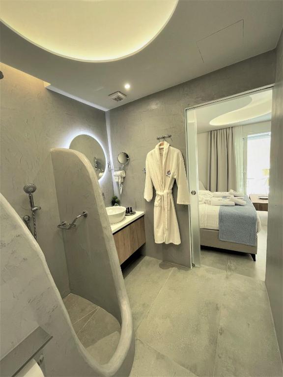 Posteľ alebo postele v izbe v ubytovaní Chic Centre Suites Athens