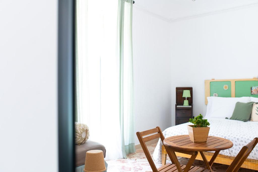 A bed or beds in a room at A Calata