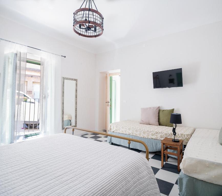 A bed or beds in a room at A Calata