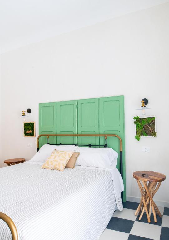 A bed or beds in a room at A Calata