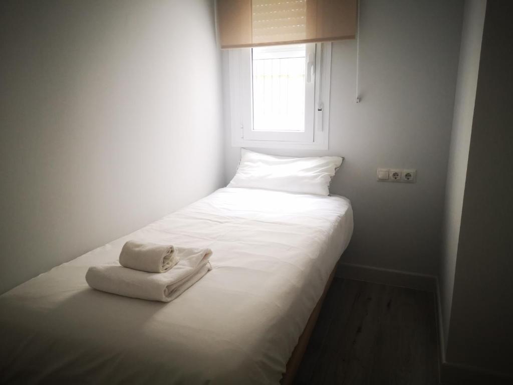 Posteľ alebo postele v izbe v ubytovaní Beautiful Apartment in the heart of seville