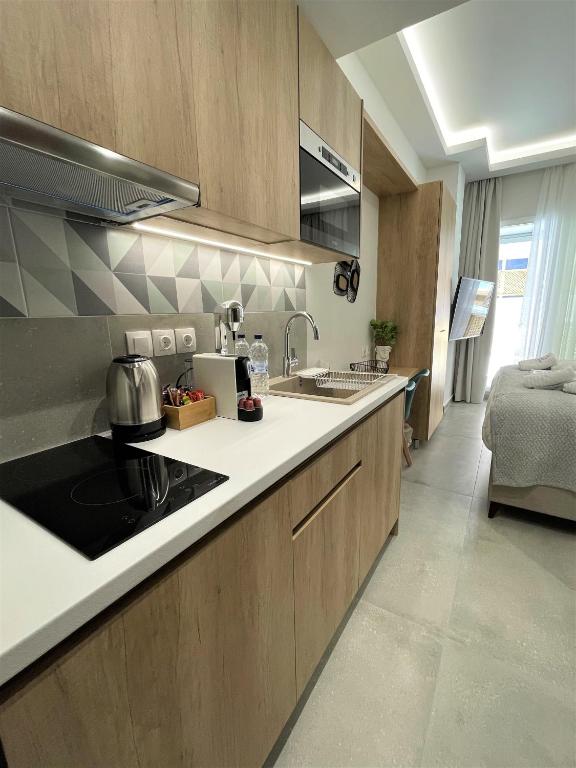Kuchyňa alebo kuchynka v ubytovaní Chic Centre Suites Athens