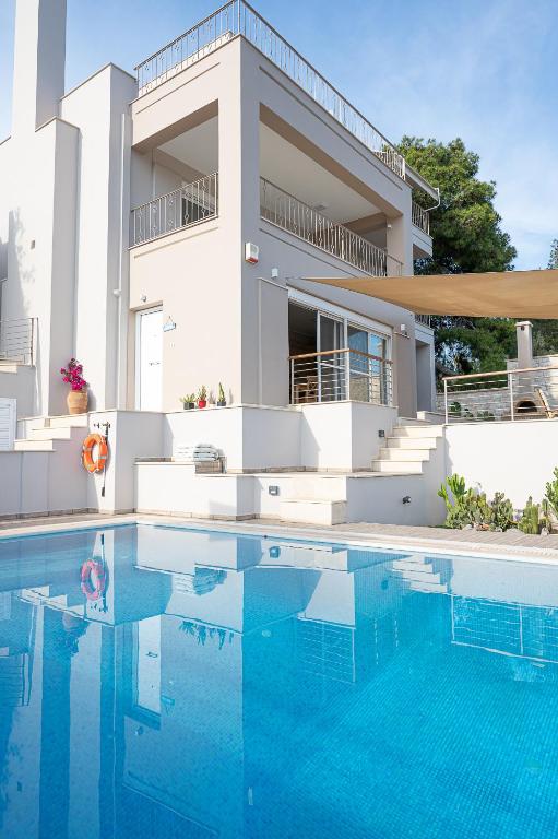 Bazén v ubytování Kalavria Luxury Suites, Afroditi Suite with magnificent sea view and private swimming pool. nebo v jeho okolí