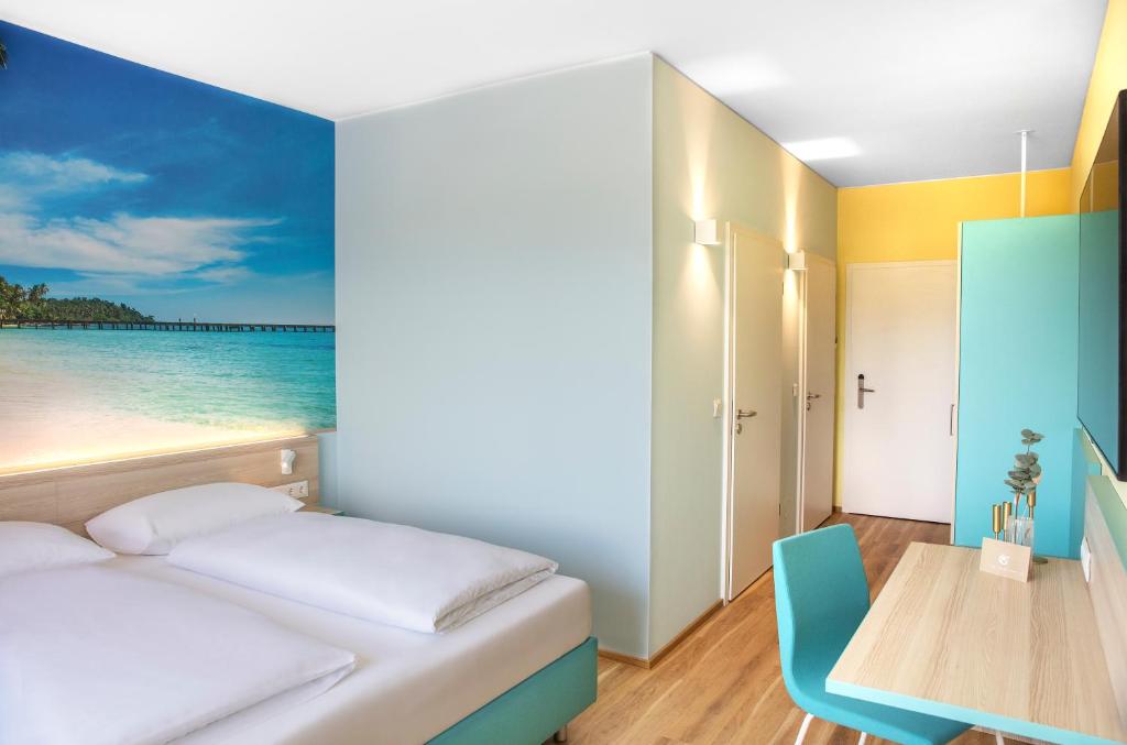 Letto o letti in una camera di Hi5-Hotel Seiersberg