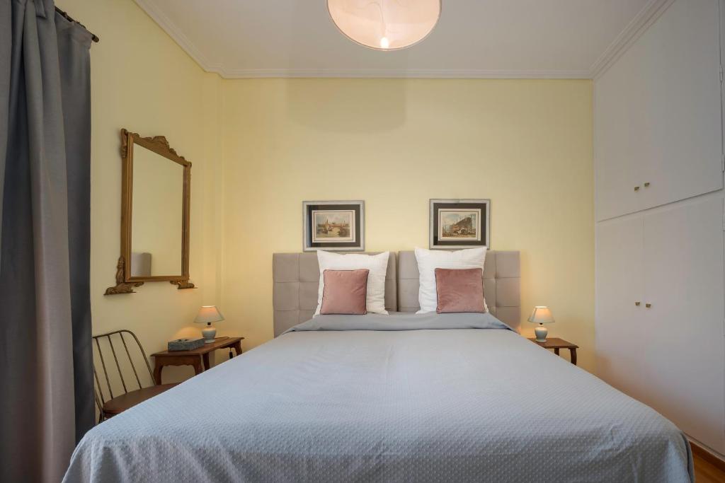 Ένα ή περισσότερα κρεβάτια σε δωμάτιο στο Magnificent Relax Athens Voula