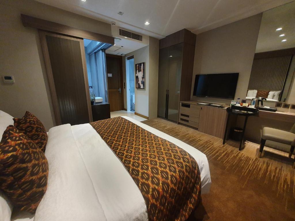 TV a/nebo společenská místnost v ubytování The Hotel Andrea