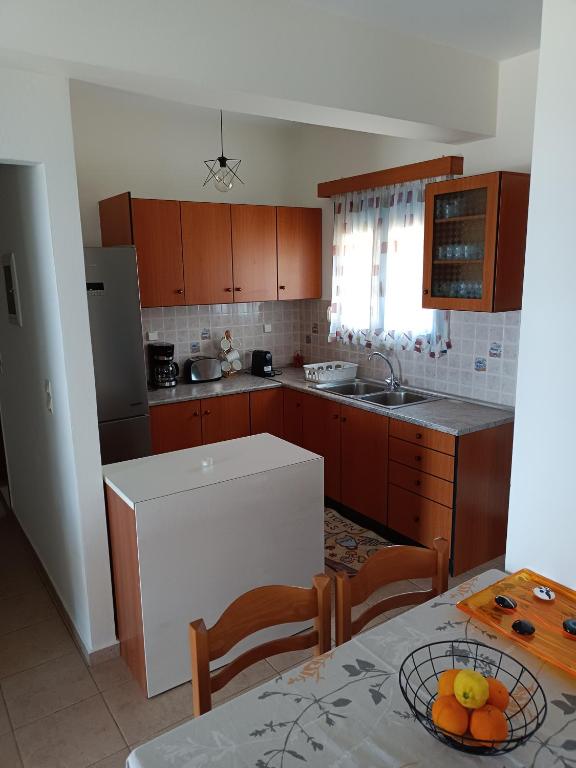 Kuchyňa alebo kuchynka v ubytovaní Sea view Pine house