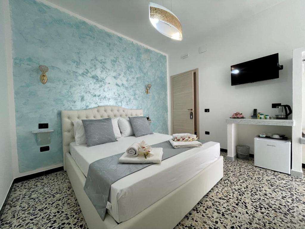 Posteľ alebo postele v izbe v ubytovaní B&B Poesia