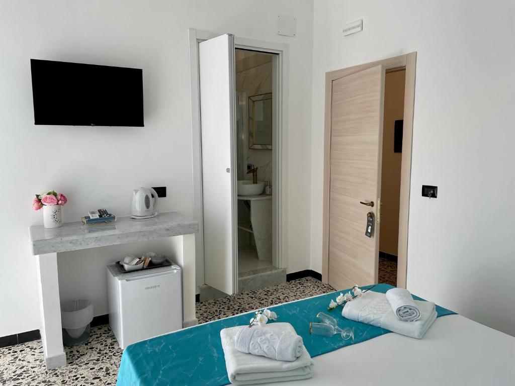 Posteľ alebo postele v izbe v ubytovaní B&B Poesia