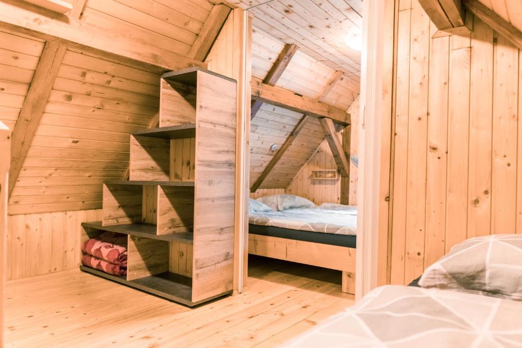 Postel nebo postele na pokoji v ubytování Počitniška hiška Jrga