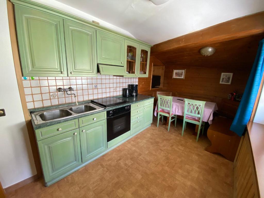 Kuchyňa alebo kuchynka v ubytovaní Saskia Residence