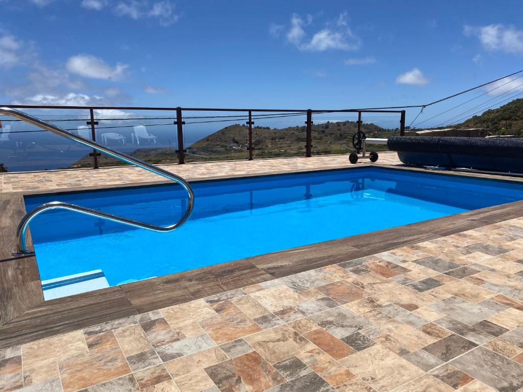 Bazén v ubytovaní Vivienda Vacacional Casa Lola alebo v jeho blízkosti