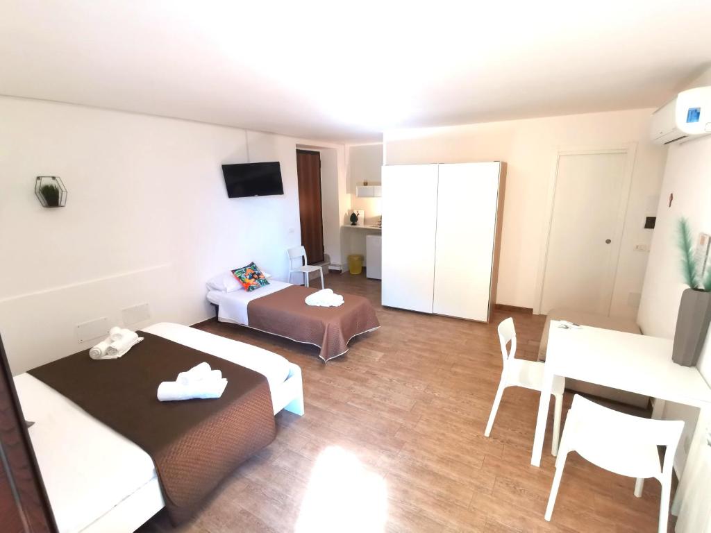 TV a/nebo společenská místnost v ubytování A due passi dal centro Sweet Rooms