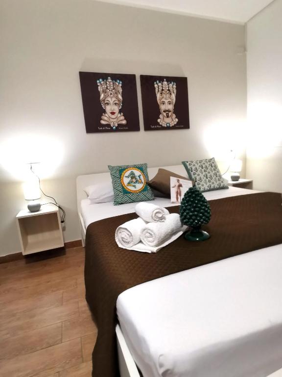 Postel nebo postele na pokoji v ubytování A due passi dal centro Sweet Rooms