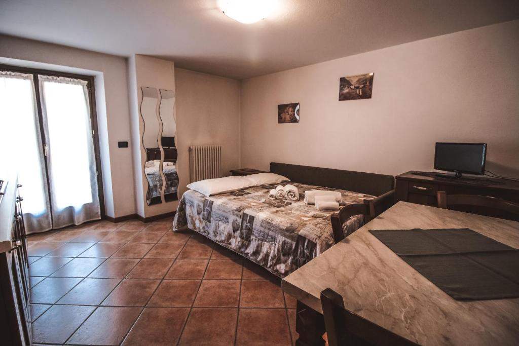 Ένα ή περισσότερα κρεβάτια σε δωμάτιο στο Residence Aquila - Mono Punta Valnera