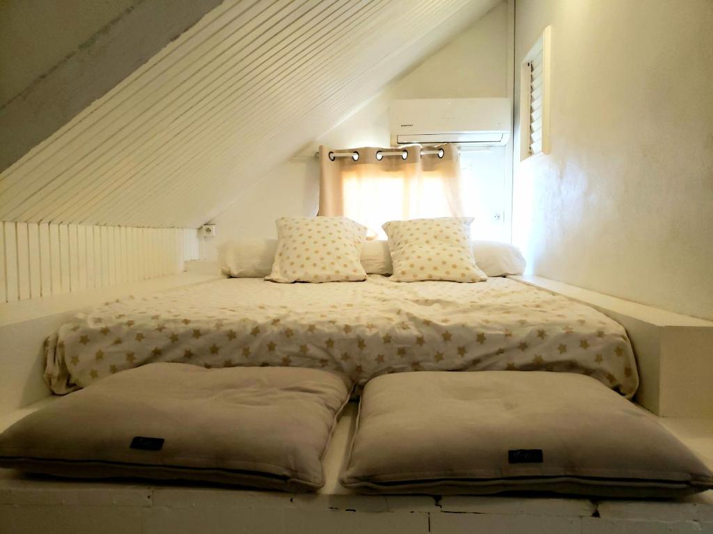 Postel nebo postele na pokoji v ubytování RESIDENCE COCO