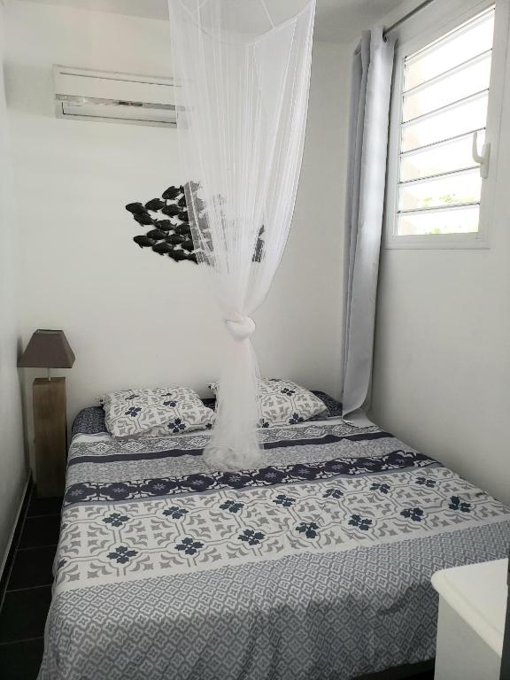 Postel nebo postele na pokoji v ubytování RESIDENCE COCO