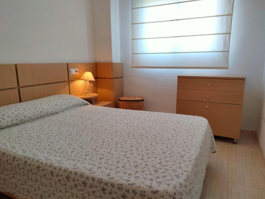 Posteľ alebo postele v izbe v ubytovaní ACV - Costa Azahar II - 2ª linea planta 3 norte