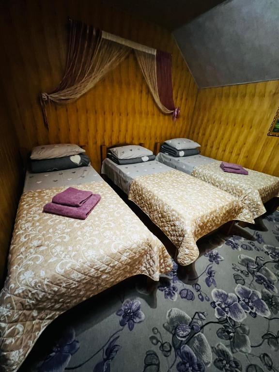 Postel nebo postele na pokoji v ubytování Pid Yavorom