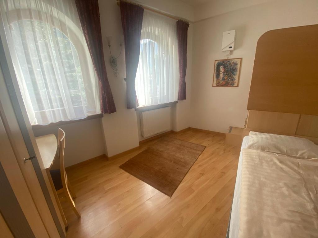 Posteľ alebo postele v izbe v ubytovaní Saskia Residence
