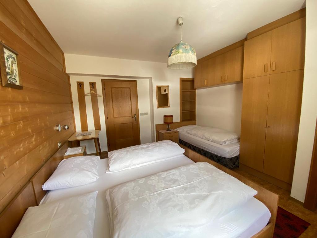 Posteľ alebo postele v izbe v ubytovaní Saskia Residence