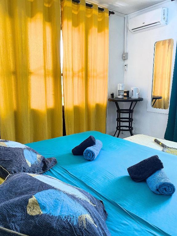 Postel nebo postele na pokoji v ubytování Auberge K-WAN Hostel - Proche Plages