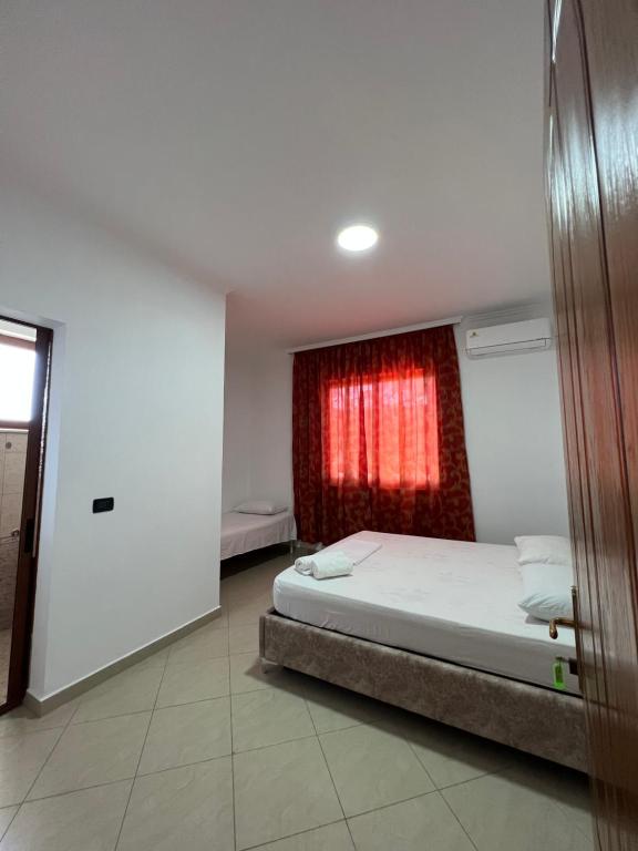 Postel nebo postele na pokoji v ubytování Guest House Il Palazzo