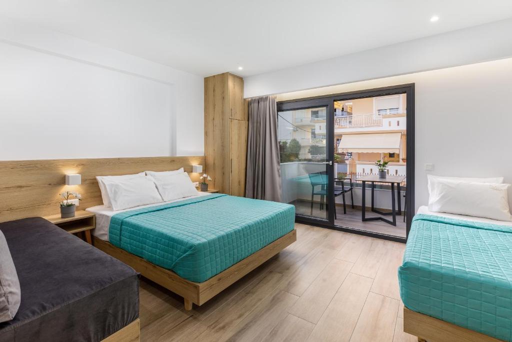 Un pat sau paturi într-o cameră la Anassa Suites