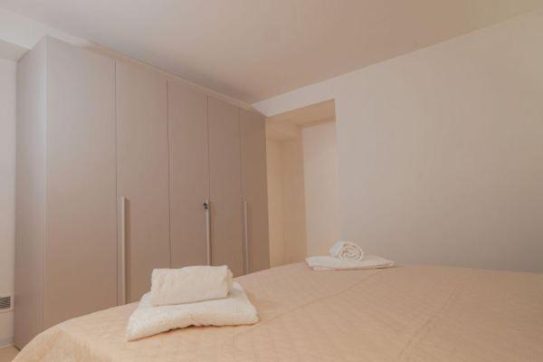 Postel nebo postele na pokoji v ubytování I Lamioni - Suite & accommodation