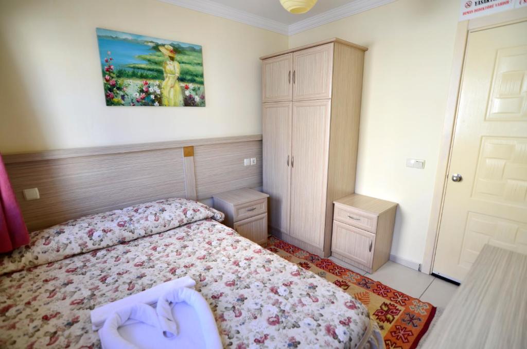 Postel nebo postele na pokoji v ubytování Sevin Hotel Pension