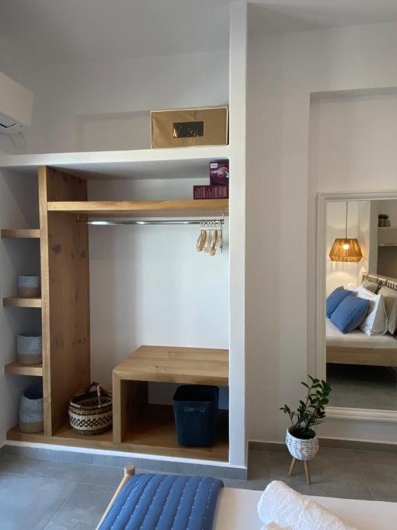 Postel nebo postele na pokoji v ubytování Xenios Zeus Apartments