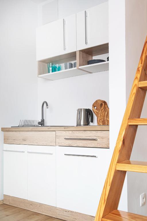 Kuchyňa alebo kuchynka v ubytovaní Apartamenty u Nosa