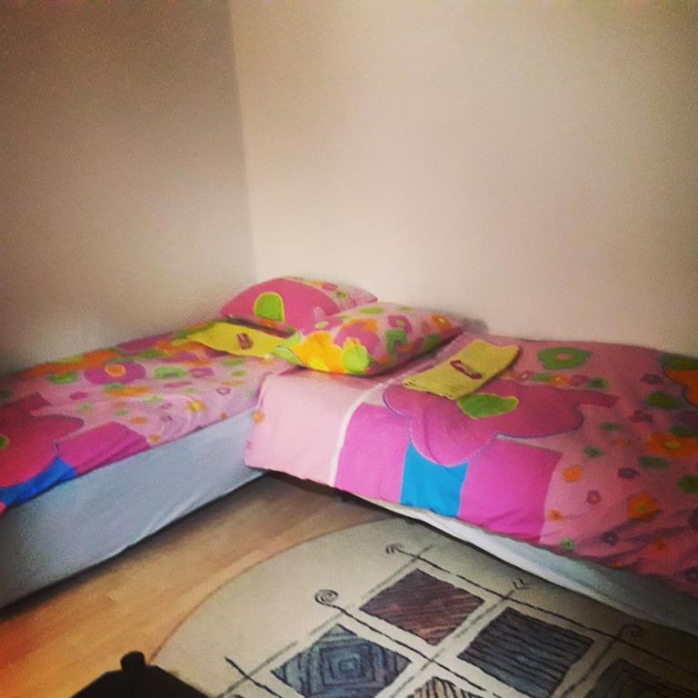 Postel nebo postele na pokoji v ubytování Kutak- stan na dan