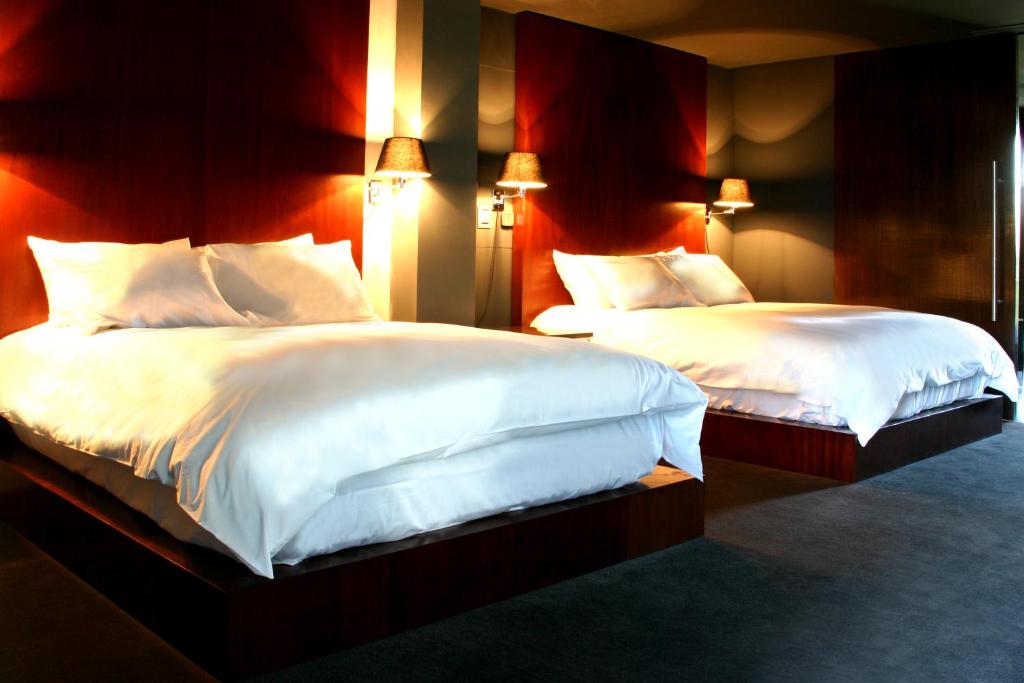 Postel nebo postele na pokoji v ubytování Demetria Hotel