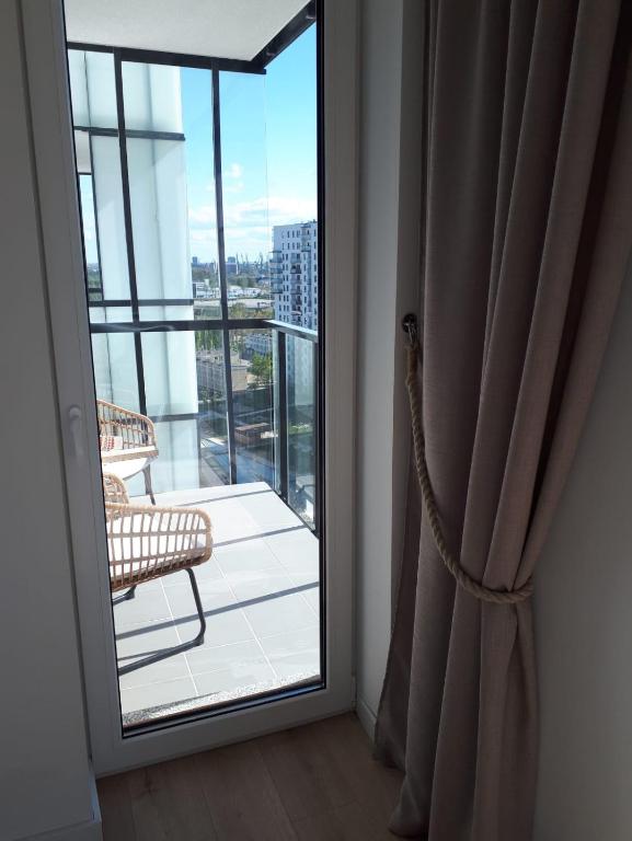Balkón alebo terasa v ubytovaní Przytulny Apartament nad morzem