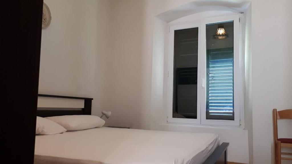 Posteľ alebo postele v izbe v ubytovaní Villa Jelka Apartment