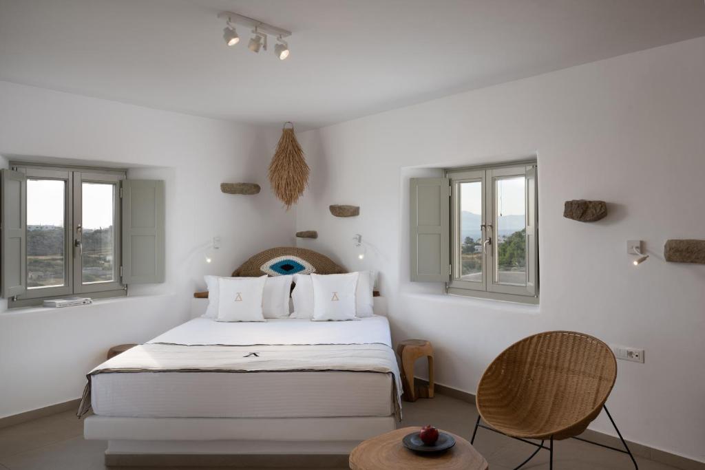 Posteľ alebo postele v izbe v ubytovaní Ikies of Mykonos