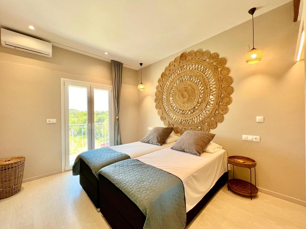 A bed or beds in a room at Elysian Studios