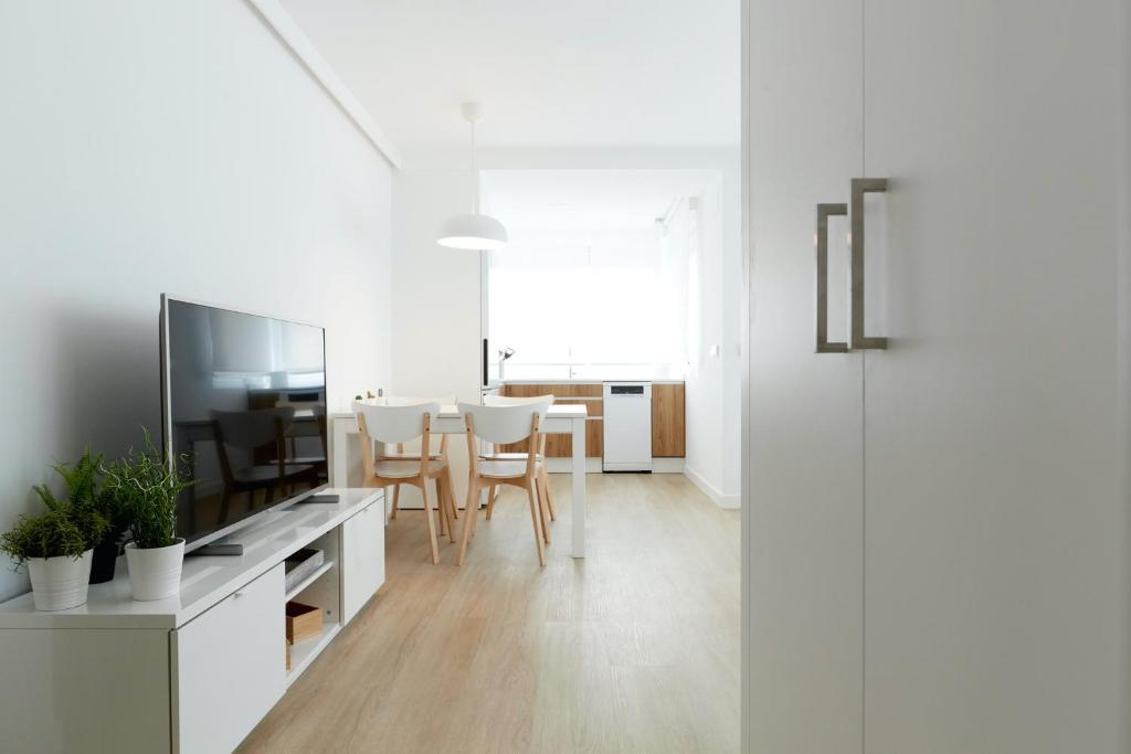 TV a/nebo společenská místnost v ubytování Precioso Loft zona Santiago Bernabéu Madrid