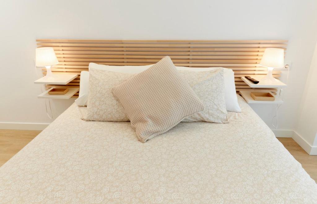 Postel nebo postele na pokoji v ubytování Precioso Loft zona Santiago Bernabéu Madrid