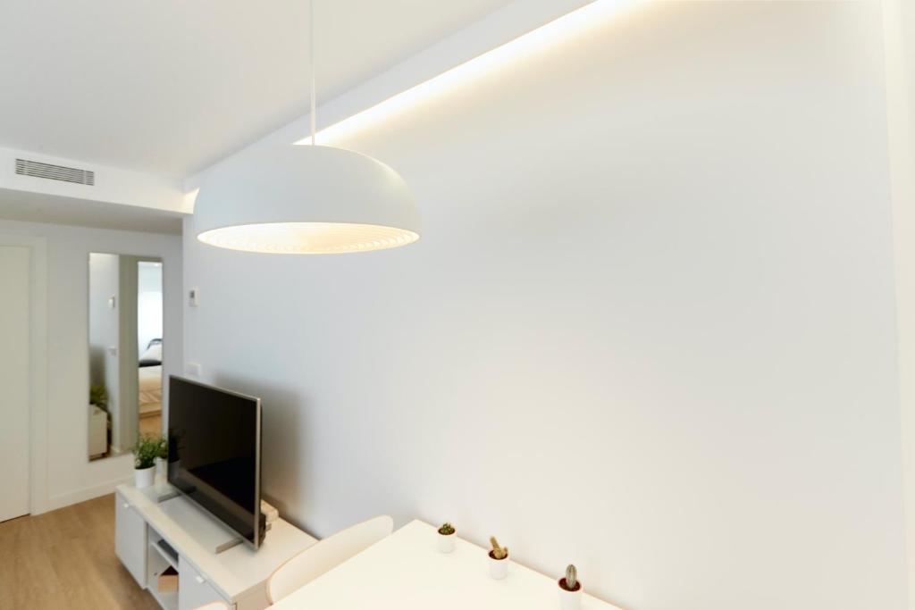 TV a/nebo společenská místnost v ubytování Precioso Loft zona Santiago Bernabéu Madrid