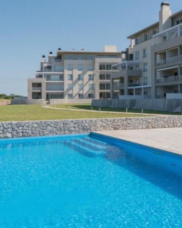 Πισίνα στο ή κοντά στο Departamento Costa Esmeralda Al Golf 19