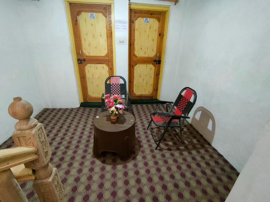 Posezení v ubytování Hotel Irshad Home Stay