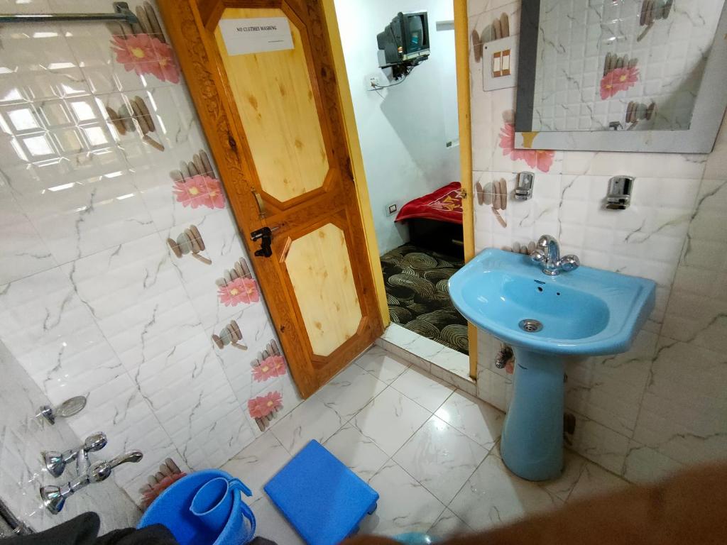 Koupelna v ubytování Hotel Irshad Home Stay