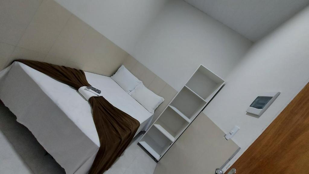 Postel nebo postele na pokoji v ubytování Mini suíte Atitude no centro de Maragogi